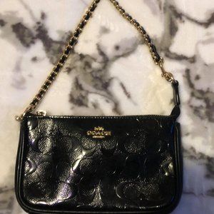 Black and gold coach mini purse with charms